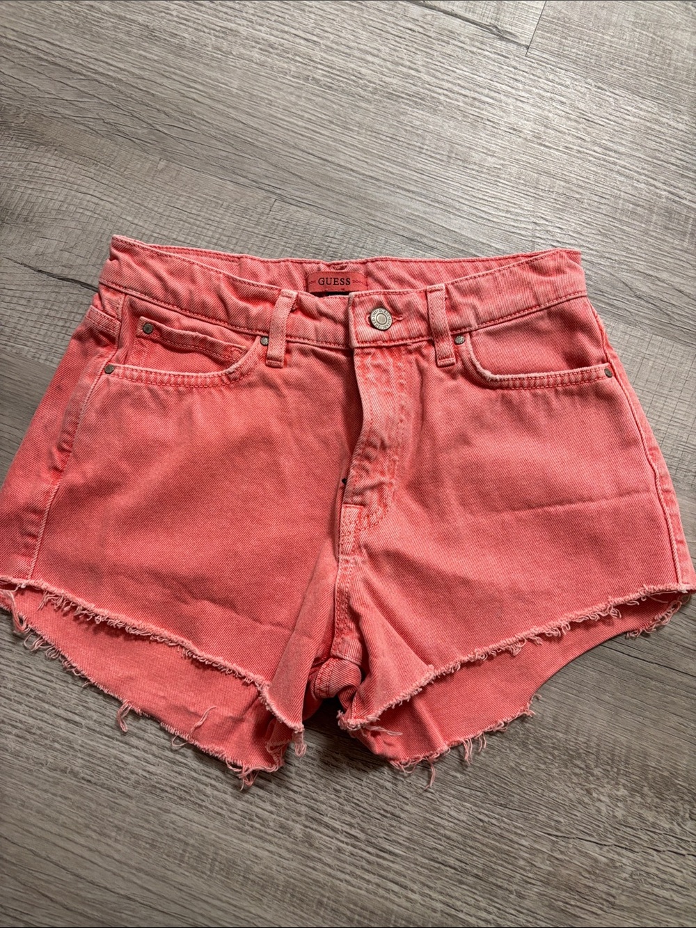 GUESS Coral Pink High-Rise Frayed Denim Shorts
